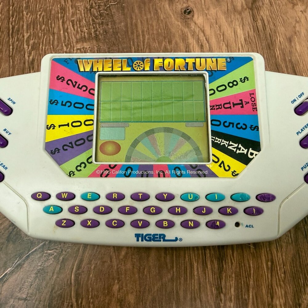 Vintage Wheel of Fortune Tiger Electronics Handheld Game 1995